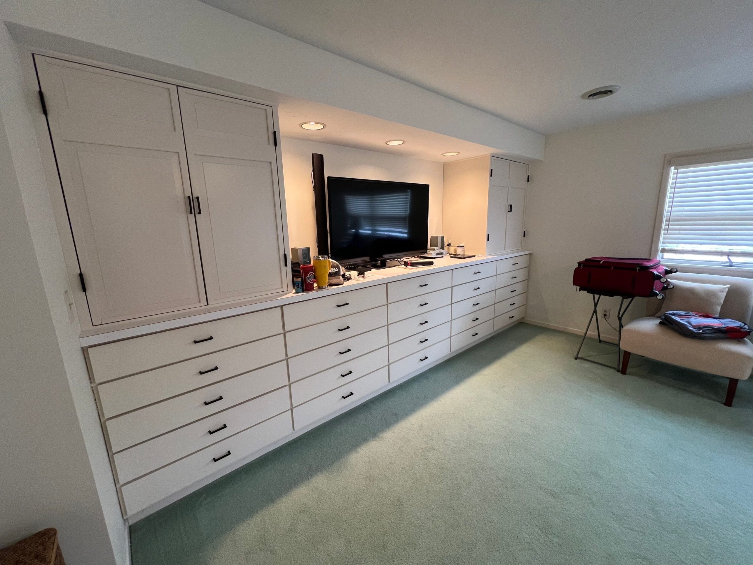 Interior painting Westlake OH — built-in cabinet and bedroom transformation after